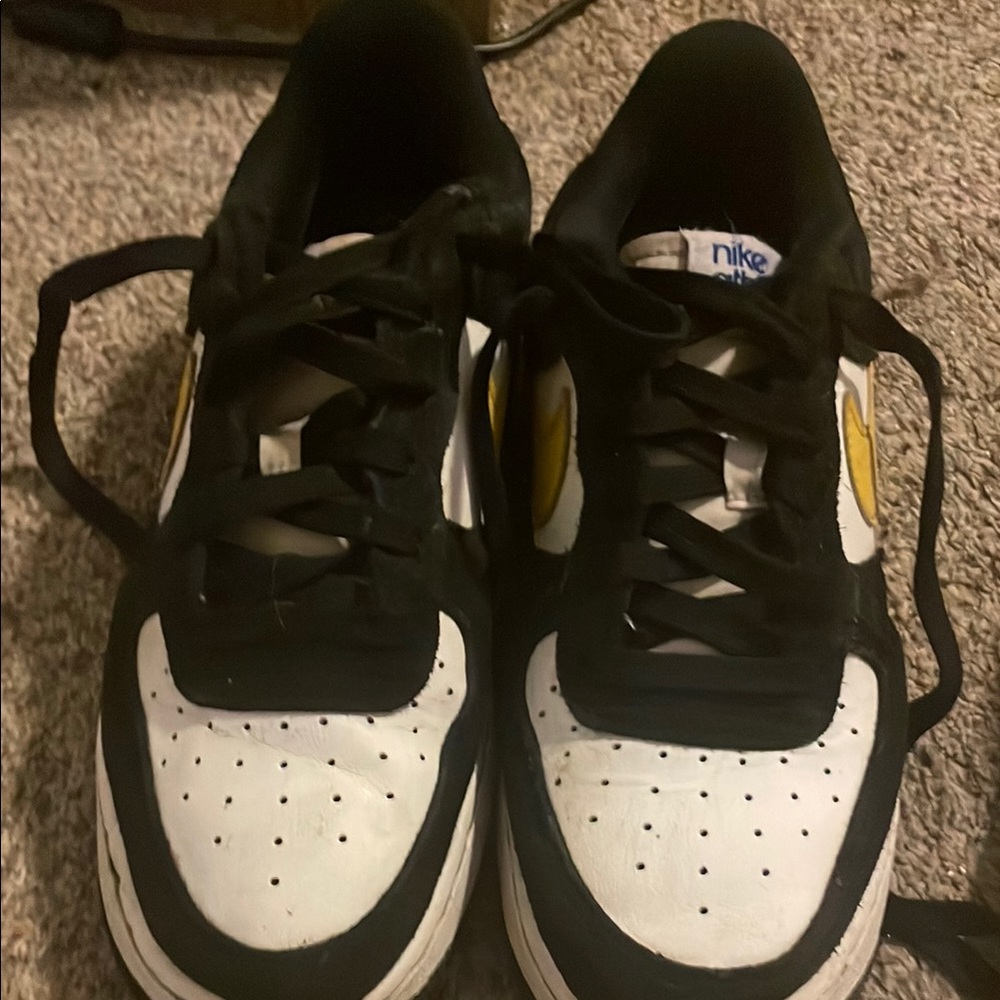 Nike Black and White Sneakers with Yellow Accents